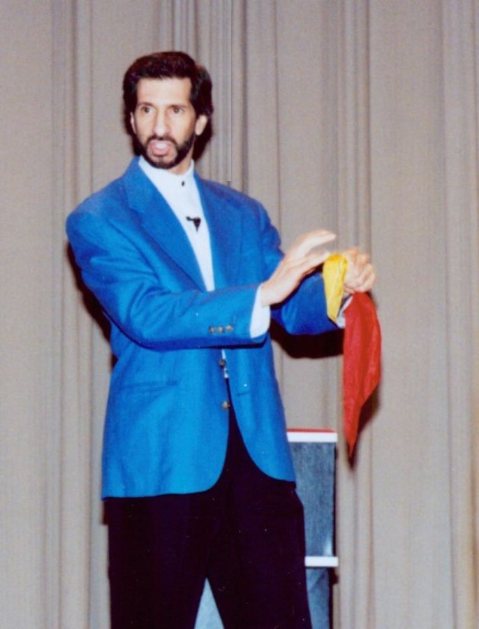 Tony Spero on stage entertaining audience